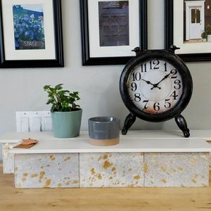 Shelves with golden cowhide